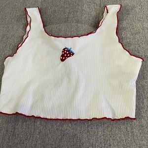 Baby T with strawberry on it